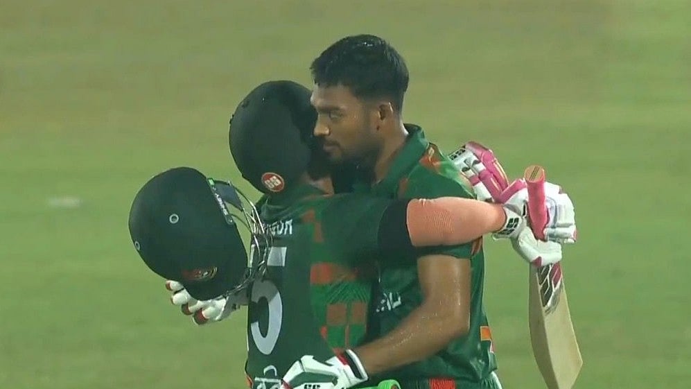 X/KAhmedUthso : Skipper Najmul Hossain Shanto (right) after scoring his century.