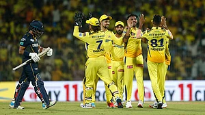 AP/R. Parthibhan : CSK players celebrate a wicket against GT at Chepauk.
