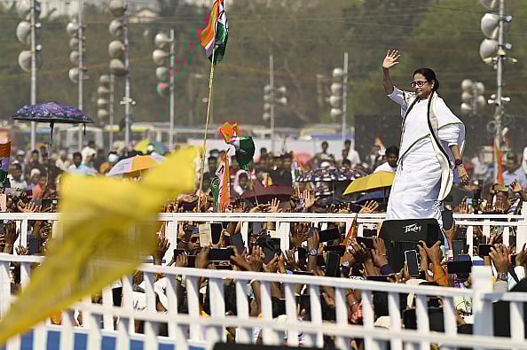 Getty Images : Chief Minister of West Bengal Mamata Banerjee greets TMC supporters in 'Jonogorjon' Rally and launched her party's Lok Sabha campaign in Kolkata
