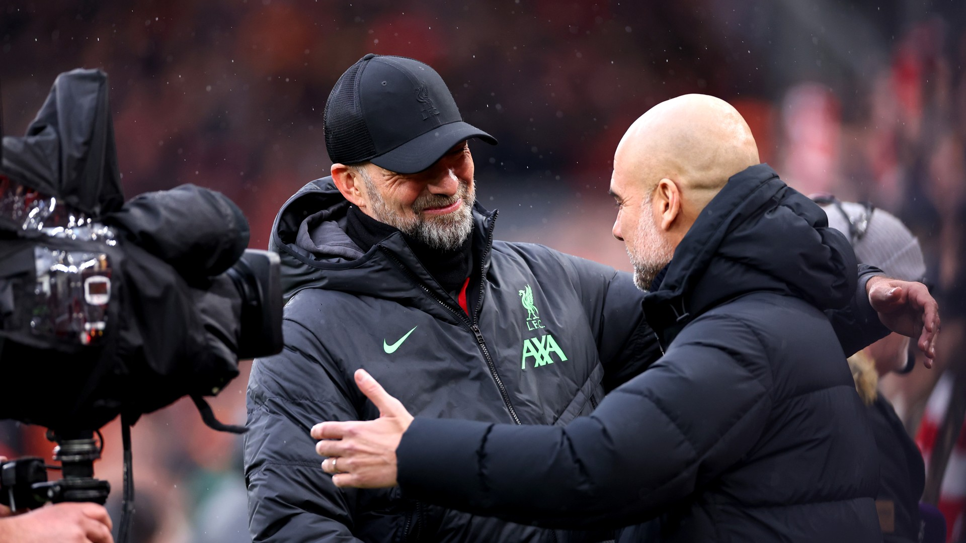 Jurgen Klopp and Pep Guardiola's final Premier League meeting ended in a frantic Liverpool 1-1 Manchester City draw at Anfield, with Arsenal, who beat Brentford 2-1 earlier, remaining clear of the Reds on goal difference at the top of the table.
