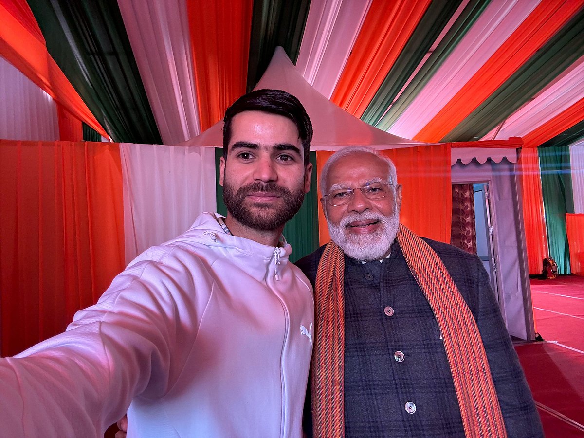 X/@narendramodi : PM Modi with a Kashmiri youth, Nazim Nazeer.