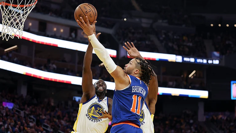 New York Knicks guard Jalen Brunson attempts a shot vs. the Golden State Warriors on March 18, 2024. - AP