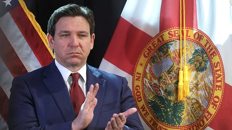 Gov. DeSantis signed a bill that will ban social media for minors in Florida. - AP