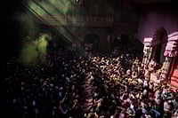 The Charms of Holi At Vrindavan: Where Men Become Radha, Gopis, And Sakhis Getty Images : Hindu devotees throw flower colour at each other as part of Holi celebrations at Banke Bihari temple in Vrindavan.