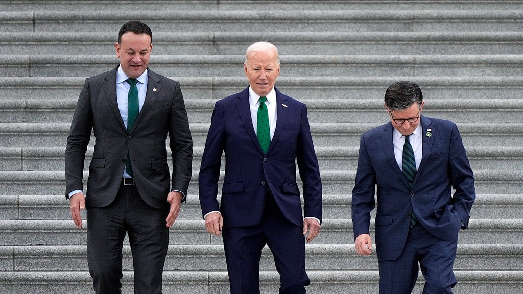 AP : From left, Irish Prime Minister Leo Varadkar, President Joe Biden, and Speaker of the House Mike Johnson, R-La., walk down the steps following the annual St. Patrick's Day gathering at the Capitol in Washington on Friday.