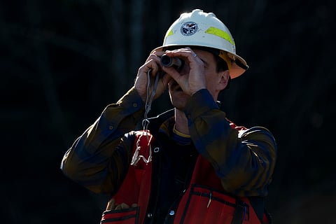 Washington State Department of Natural Resources geologist Mitch Allen visits the site of a landslide in the Capitol Forest, Thursday, March 14, 2024, in Olympia, Wash.