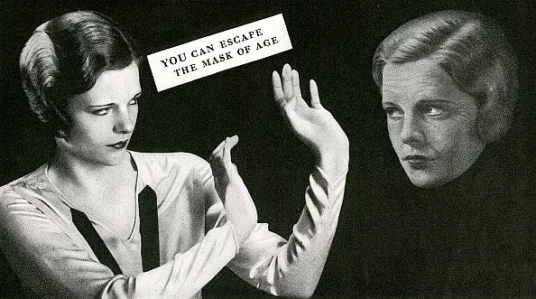 Getty Images : Young woman trying to hold back old age; screen print from a photograph, 1926 (representative image)