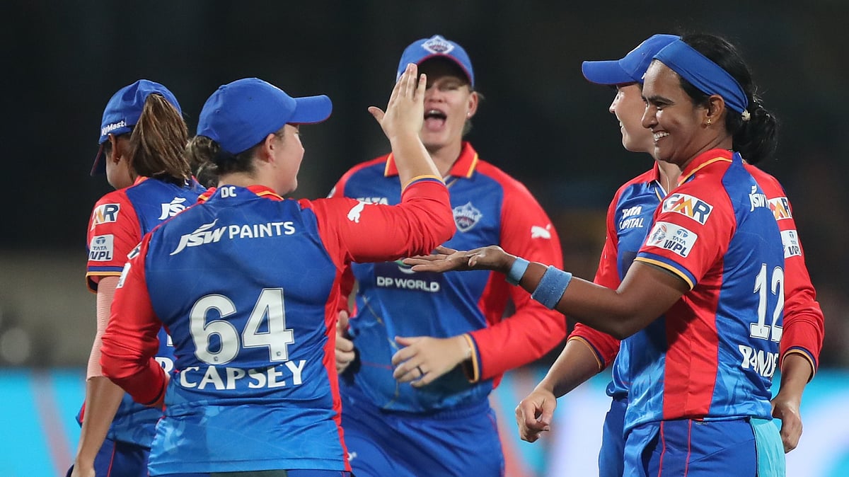 Photo: X/ @wplt20 : Delhi Capitals players celebrating the wicket of Gujarat Giants in WPL 2024.