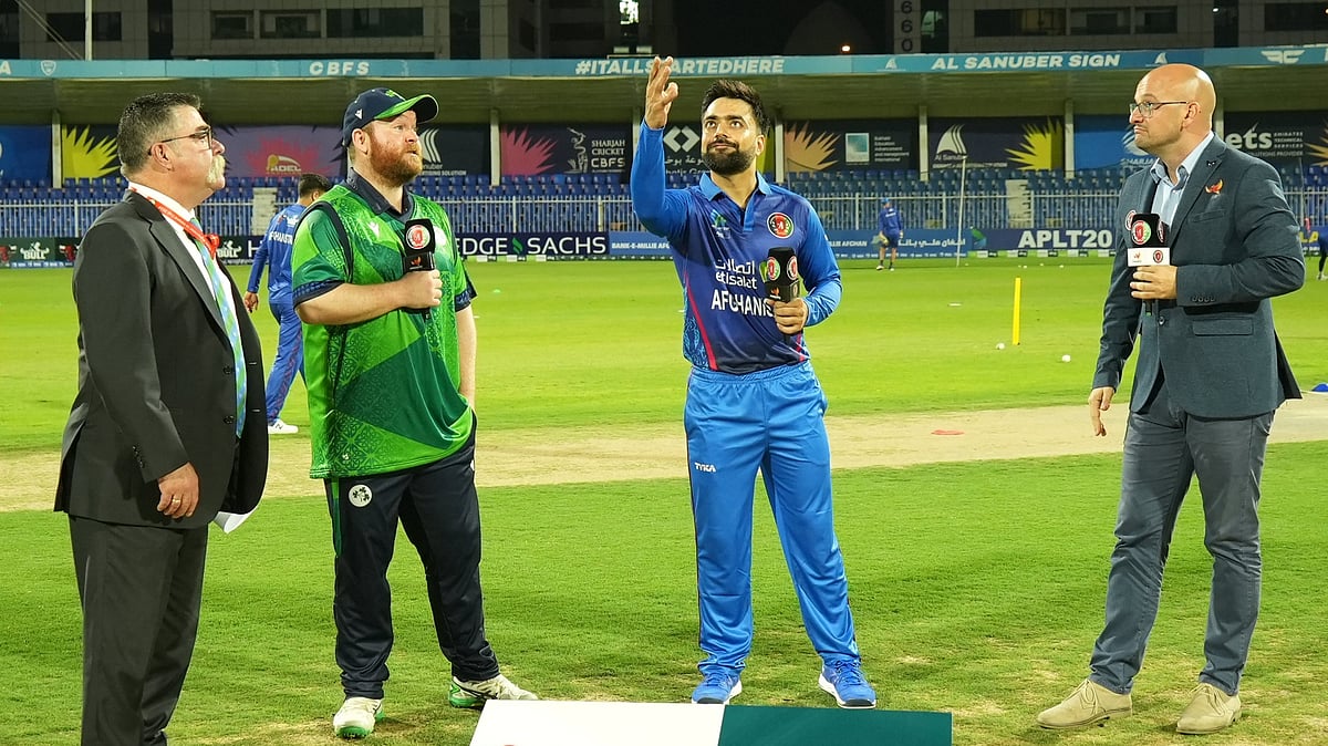 Photo: X/ @ACBofficials : Ireland captain Paul Stirling (L) with Afghan skipper Rashid Khan at the toss for the first T20I.