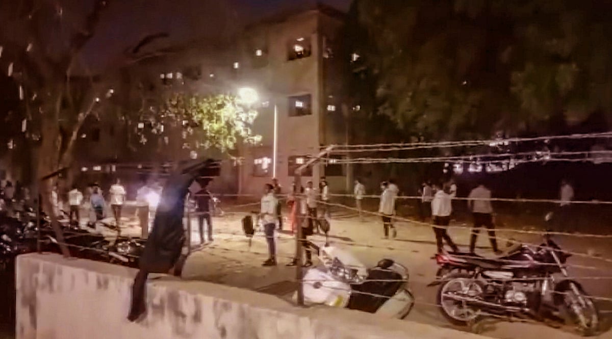 PTI Photo : A scene after foreign students were assaulted allegedly by a group of persons on the Gujarat University hostel campus, Ahmedabad.