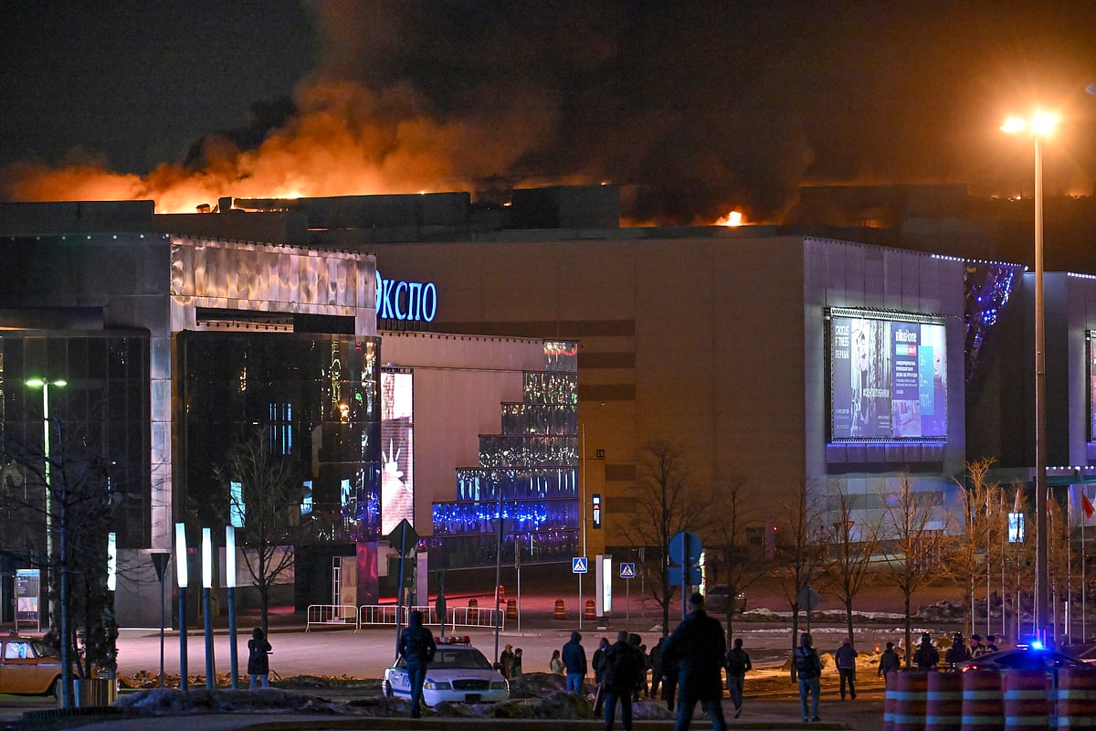 AP : Cloud of smoke emerging from Moscow's Crocus City Hall on Friday |