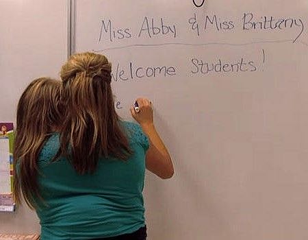 Abby and Brittany Hensel teaching.