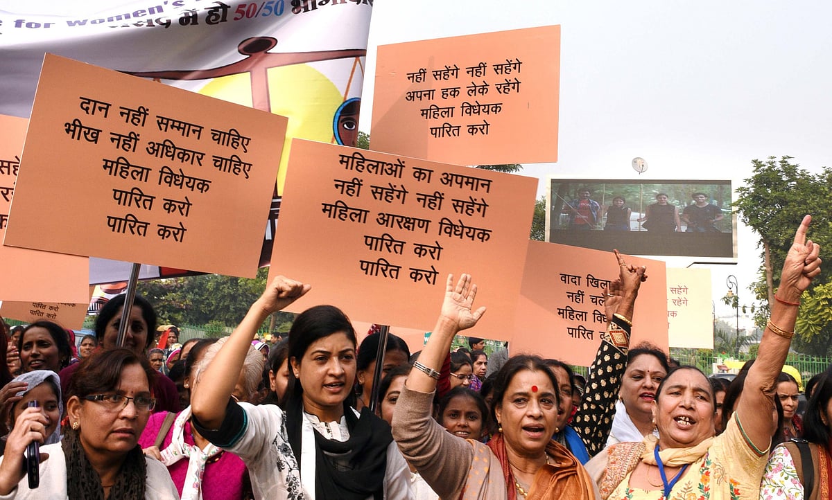 Getty Images : Women protesters in Delhi's Connaught Place demanding Women's Reservation Bill.