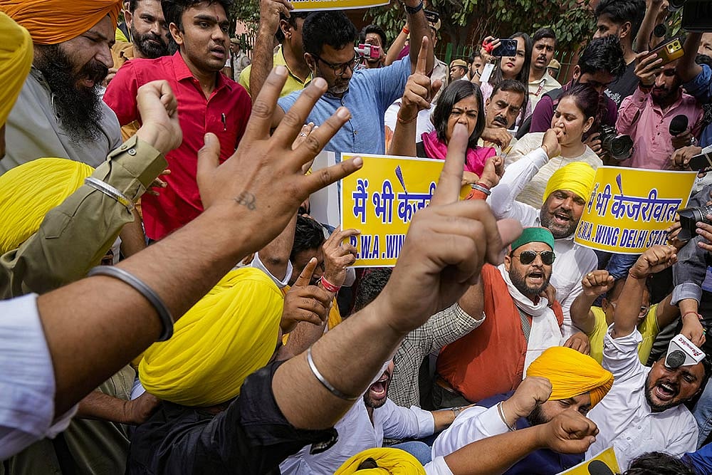 Photo: PTI/Shahbaz Khan : AAP protest at the BJP headquarters