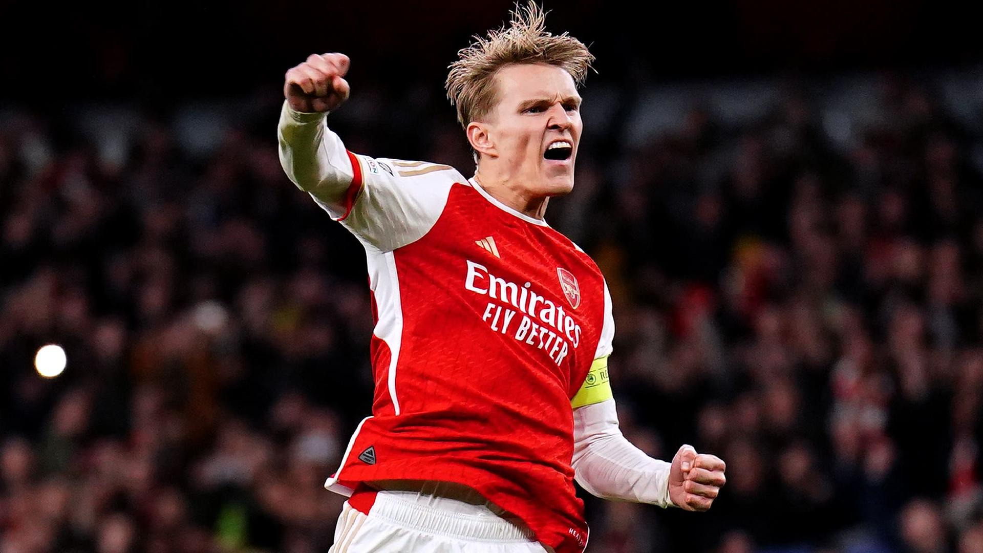 Arsenal captain Martin Odegaard celebrates after scoring the first penalty of the shoot-out win over Porto. - Zac Goodwin/PA