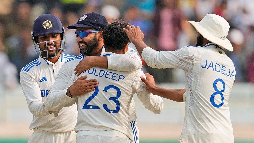 AP/Ajit Solanki : India captain Rohit Sharma (second from left) celebrates an England wicket with Kuldeep Yadav during the five-match home Test series.