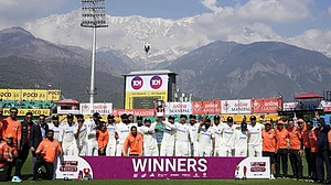 (AP Photo/Ashwini Bhatia)
: Indian cricket team members and support staff pose with the winning trophy after they won the fifth test match against England in Dharamshala, India, Saturday, March 9, 2024.