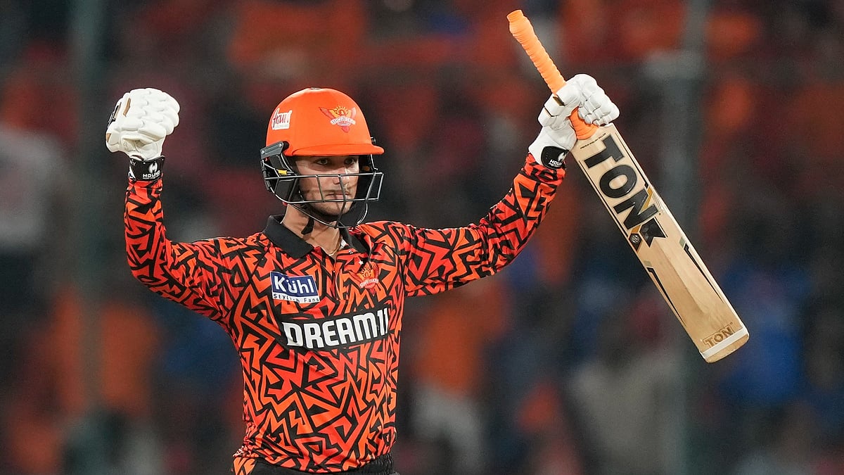 Sunrisers Hyderabad's Abhishek Sharma celebrates his fifty against Mumbai Indians during their Indian Premier League 2024 match in Hyderabad on March 27, 2024. - AP/Mahesh Kumar A