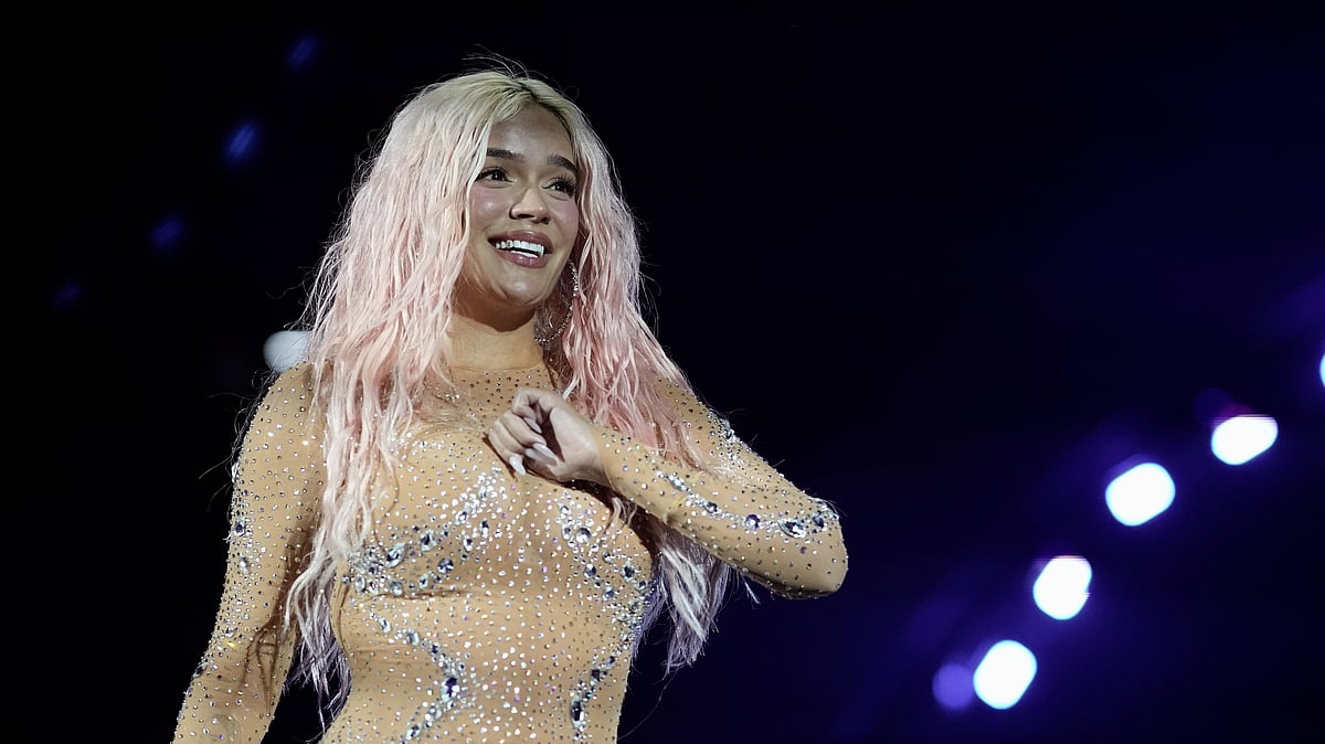 AP : Karol G becomes Billboard's Woman of the Year 2024.