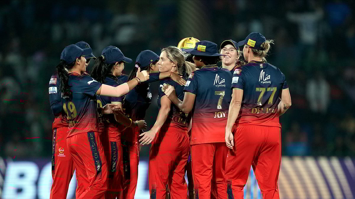 PTI : Royal Challengers Bangalore players celebrate wicket of Delhi Capitals' Shafali Verma during the Women's Premier League 2024 final match at the Arun Jaitley Stadium in New Delhi on March 17, 2024.