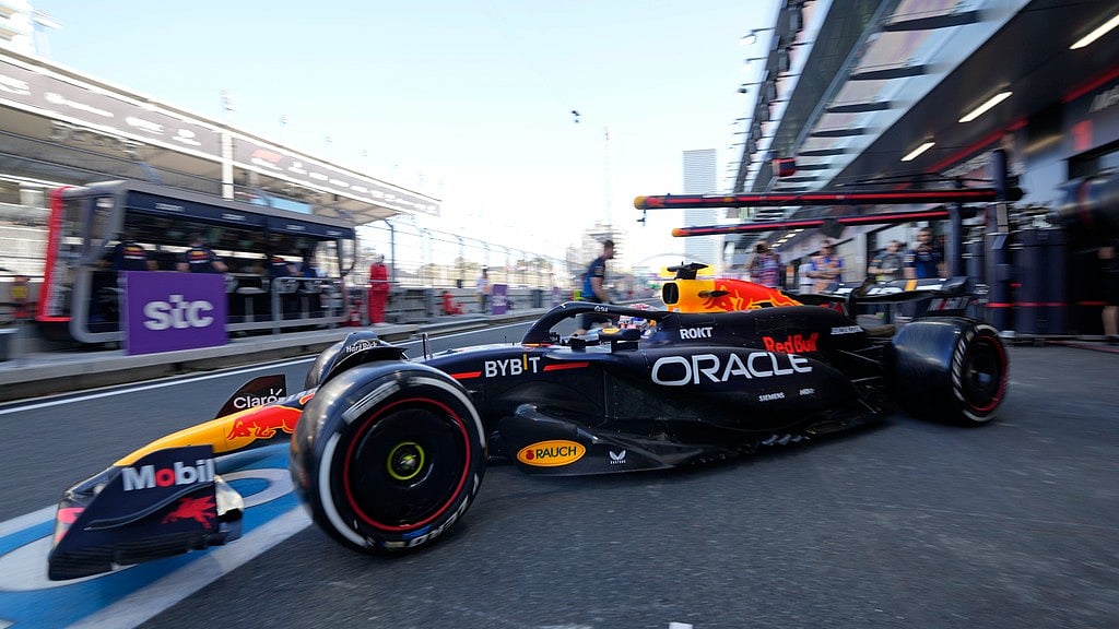 AP : Red Bull driver Max Verstappen of the Netherlands drives his car out of the team's pit garage for the first practice session ahead of the Formula One Saudi Arabian Grand Prix at the Jeddah Corniche Circuit in Jeddah, Saudi Arabia, March 7, 2024.