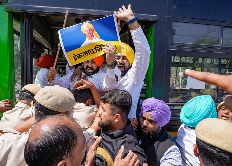 Police detain AAP supporters gathered at the Shaheedi Park to protest over the arrest of Delhi Chief Minister Arvind Kejriwal, in New Delhi, Saturday, March 23, 2024. - PTI