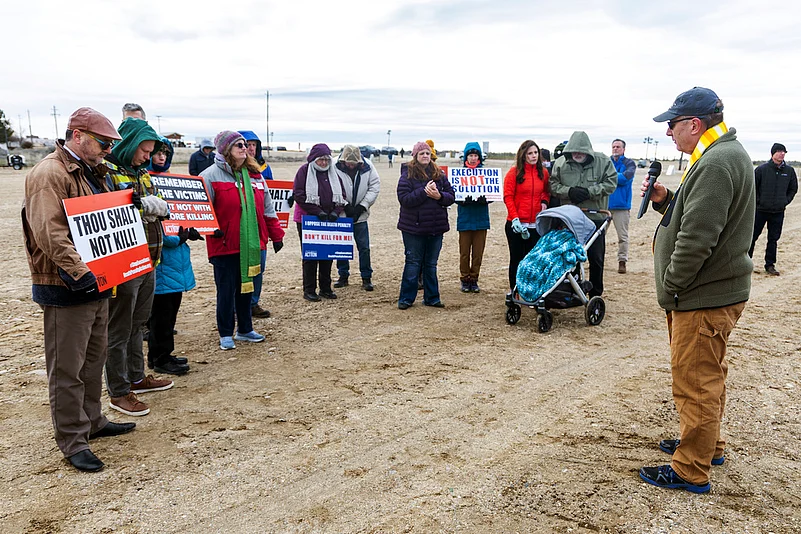 Protesters gather outside of the Idaho State prison complex near Kuna, Idaho, to protest the death penalty, Wednesday, Feb. 28, 2024. Idaho halted the execution of serial killer Thomas Eugene Creech on Wednesday after medical team members repeatedly failed to find a vein where they could establish an intravenous line to carry out the lethal injection. 

