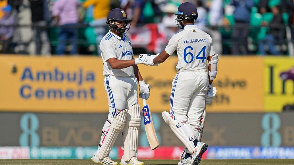 AP : Rohit Sharma, left, with teammate Yashasvi Jaiswal on the first day of the fifth and final Test between England and India in Dharamshala.