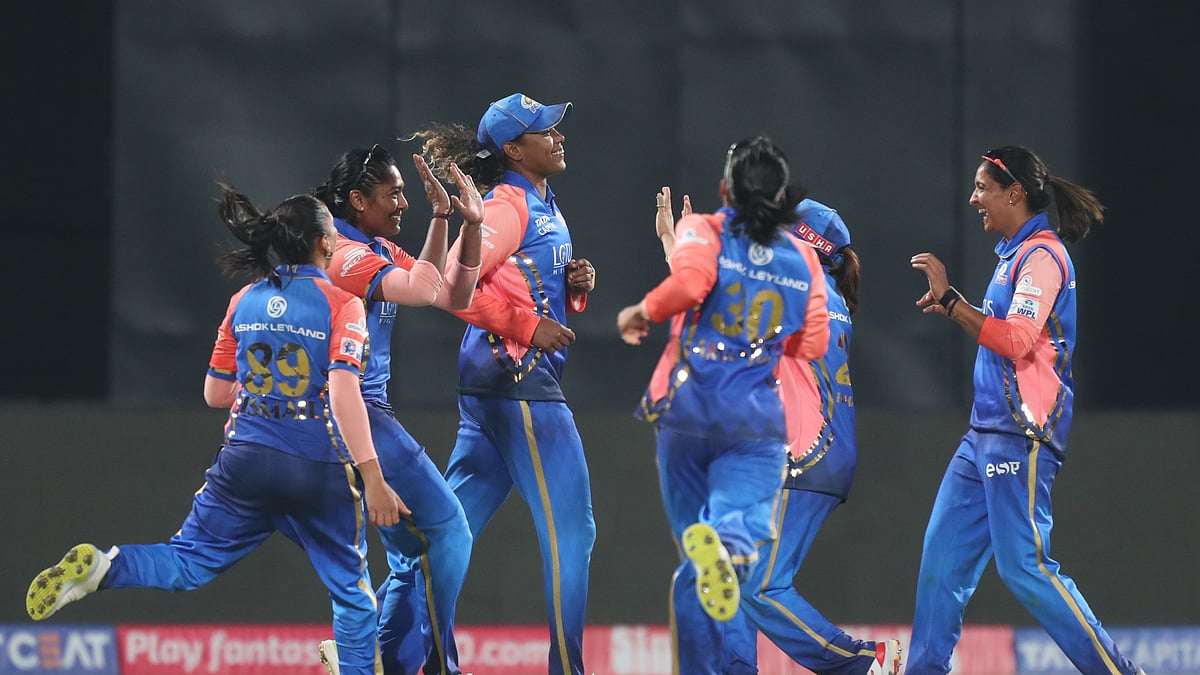 Photo: X/ @wplt20 : Mumbai Indians captain Harmanpreet Kaur (R) celebrating with her teammates the 42-run victory over UP Warriorz in WPL 2024.