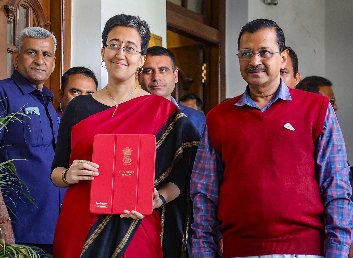 PTI : Delhi Finance Minister Atishi Singh with Chief Minister Arvind Kejriwal arrives at the Vidhan Sabha to present the State Budget 2024-25, in Delhi, Monday, March 4, 2024. 