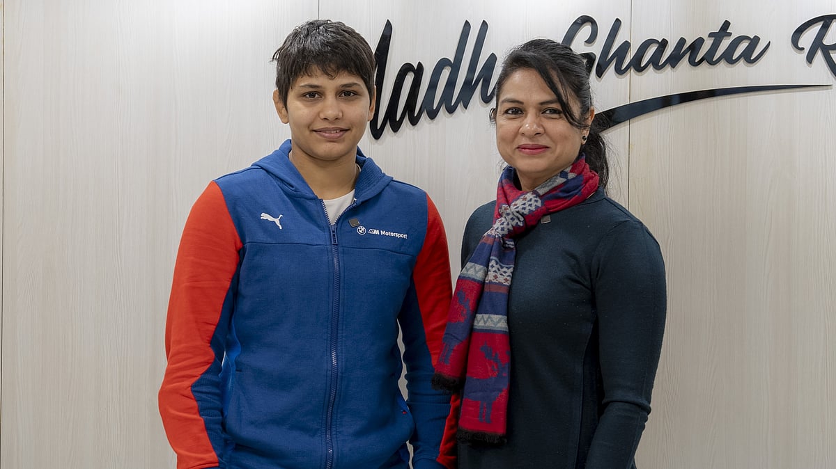 SAI Media : Two-time under-20 world wrestling champion Antim Panghal (left) with Fit India Champions Podcast host Ekta Vishnoi.
