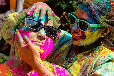 People celebrate Holi in Kullu