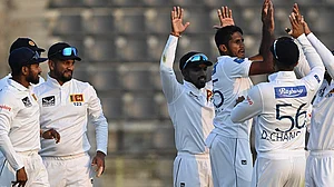 Photo: X/ICC : Sri Lanka players celebrate a Bangladesh wicket on Day 1 of the first Test match in Sylhet.