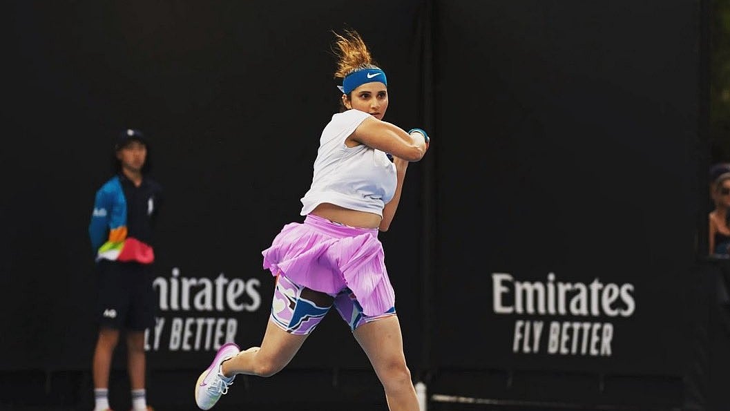 X/Sania Mirza : File photo of Indian tennis legend Sania Mirza in action at the Australian Open in January 2023 . 