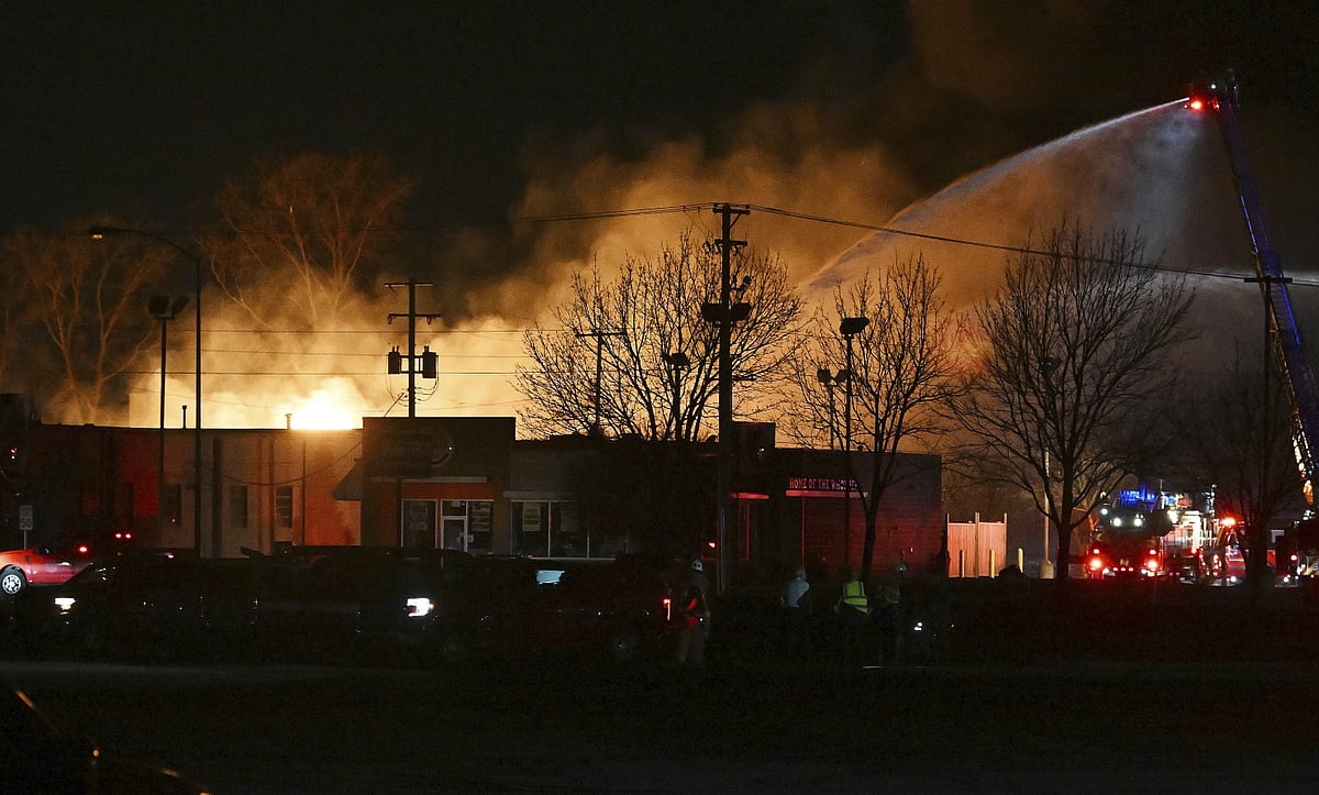 AP : Police warn people to stay away as an industrial fire with multiple explosions shook a northern Detroit suburb.