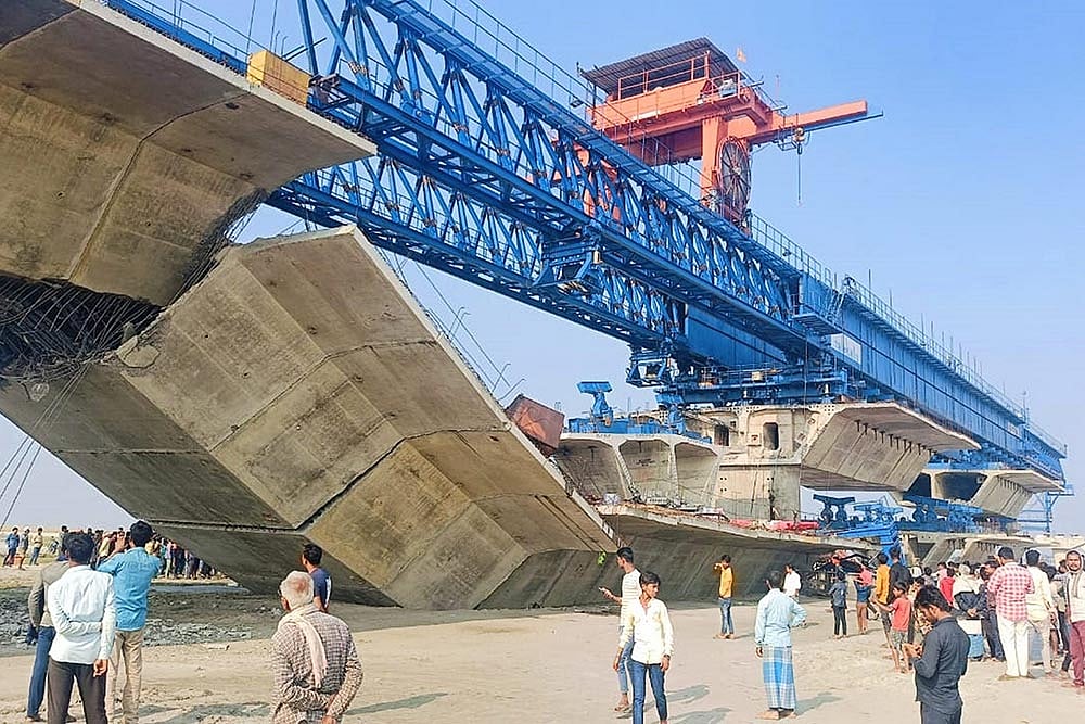 Photo: PTI : One killed in under-construction bridge collapse