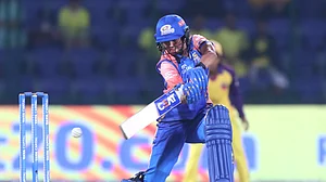 Photo: X/ @wplt20 : Mumbai Indians captain Harmanpreet Kaur playing a shot against UP Warriorz