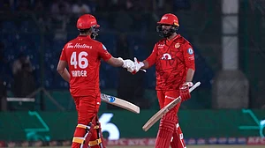 AP : Islamabad United's Imad Wasim, right, celebrates with Haider Ali after their team won the Pakistan Super League 2024 eliminator match against Peshawar Zalmi in Karachi.