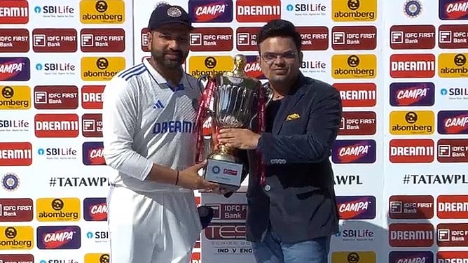 X/Kirket4Life : Indian cricket team skipper Rohit Sharma with the winning trophy alongside BCCI secretary Jay Shah (right).