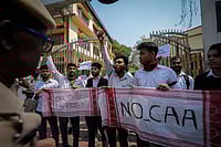 Photo: AP/Anupam Nath : Protest After MHA Notified CAA Rules