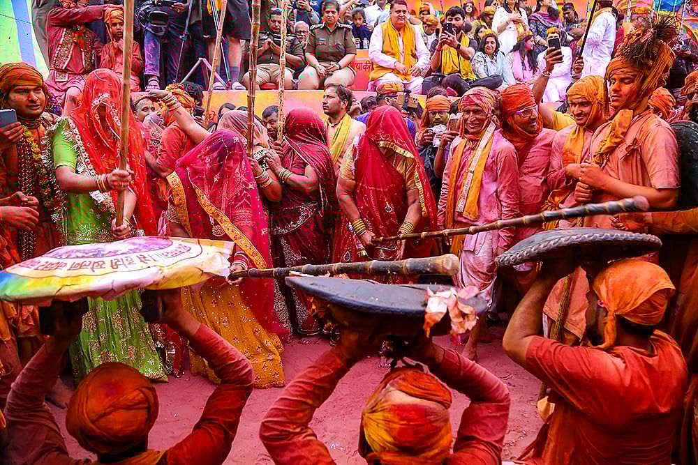 | Photo: PTI : Lathmar Holi Celebration