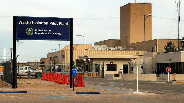 A sign marks the Waste Isolation Pilot Plant, March 6, 2014, near Carlsbad, N.M. - AP