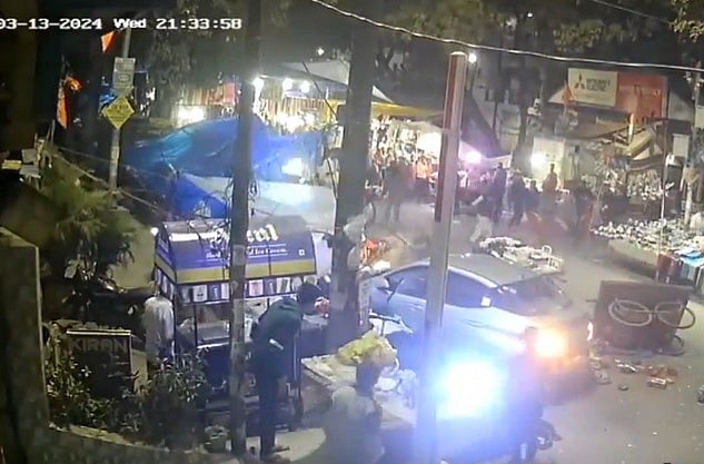 Screen grab from video posted on X/ANI : Police said that the the driver of the vehicle was taken into custody and further action was being taken
