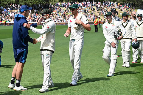 Tim Southee, left, and Nathan Lyon shake hands following Australia's 172-run win in the first Test against New Zealand at the Basin Reserve in Wellington on Sunday (March 3, 2024).