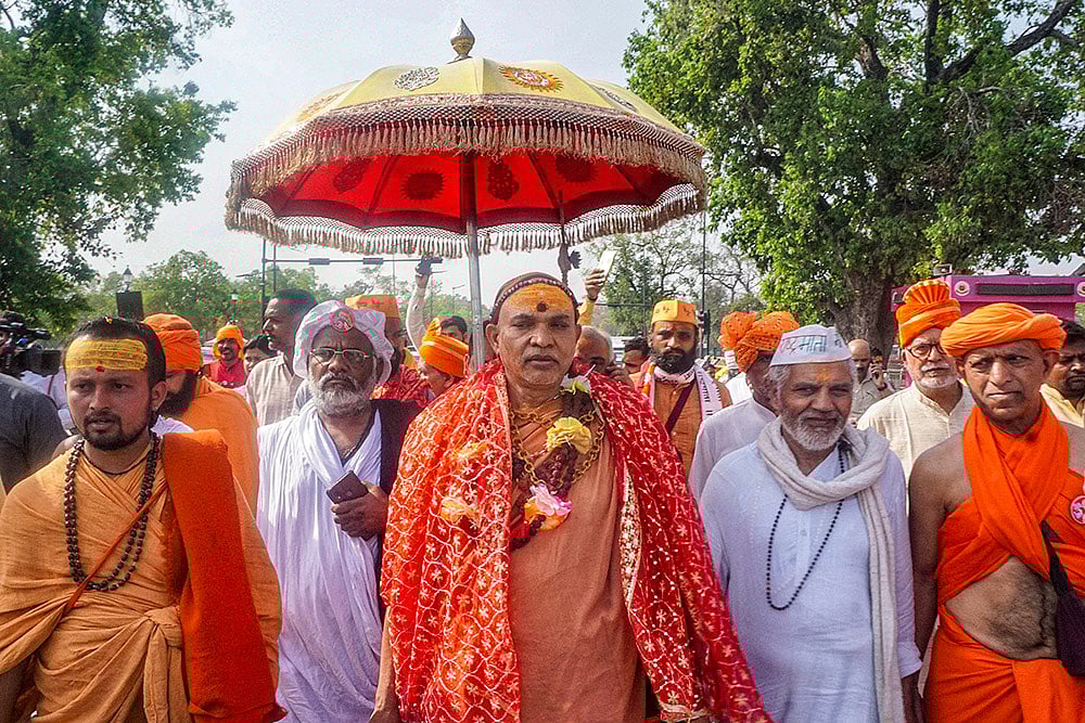 Photo: PTI : Avimukteshwaranand Saraswati at protest