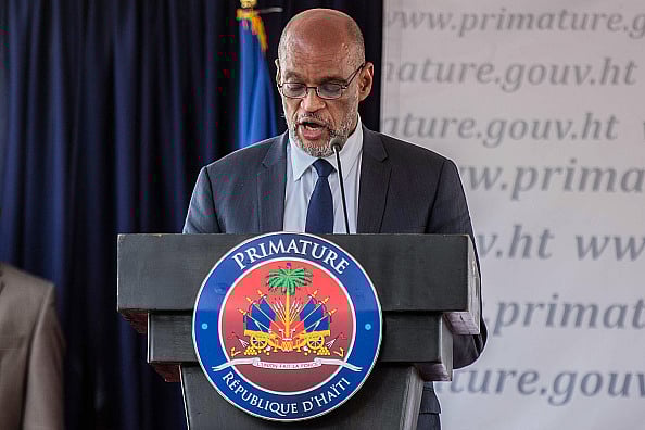 Getty Images : Ariel Henry speaks during a conference as he takes office as Prime Minister of Haiti at the Prime Minister's Office on July 20, 2021