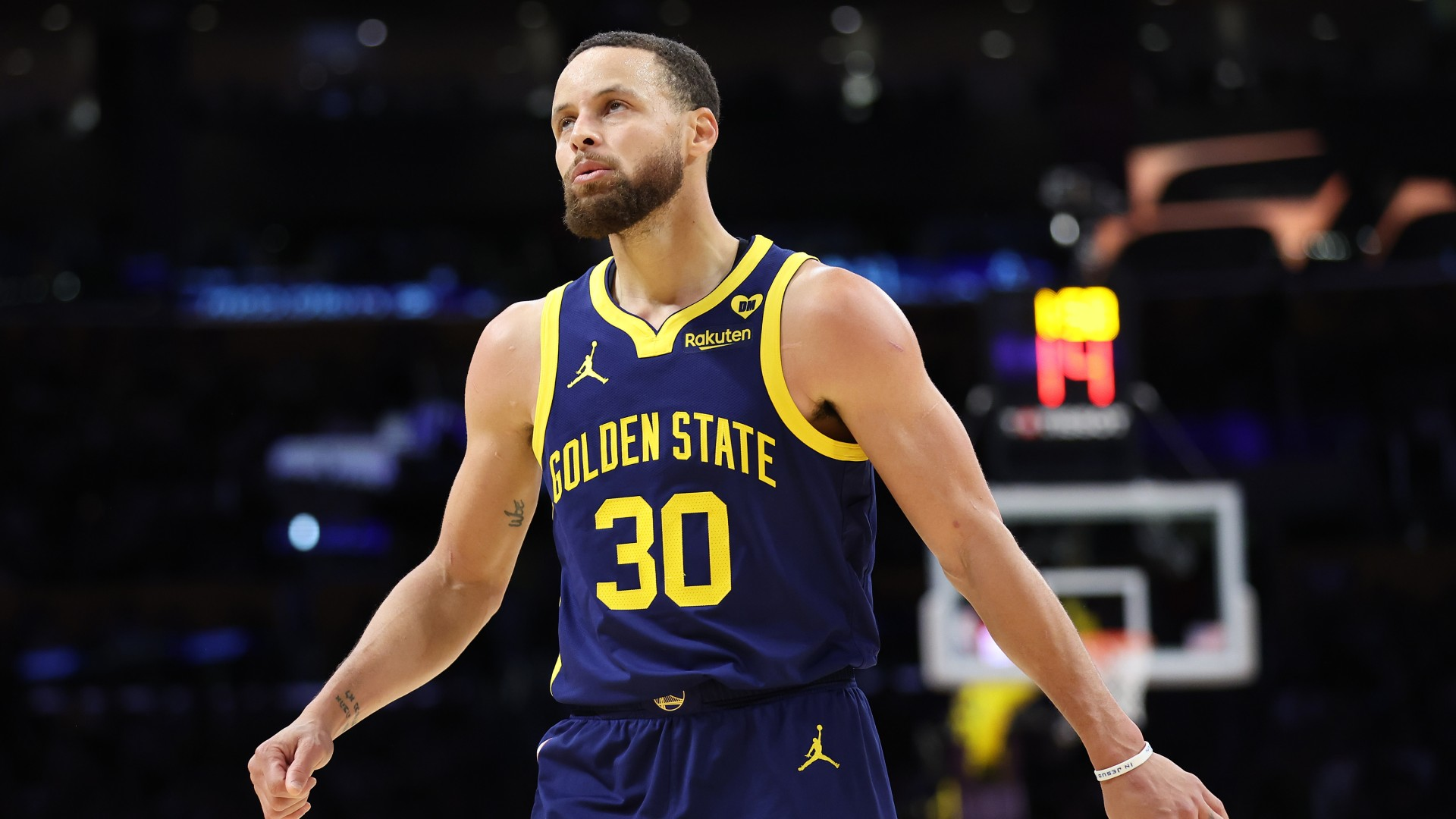 Stephen Curry #30 of the Golden State Warriors looks on during the first half of a game against the Los Angeles Lakers. - null
