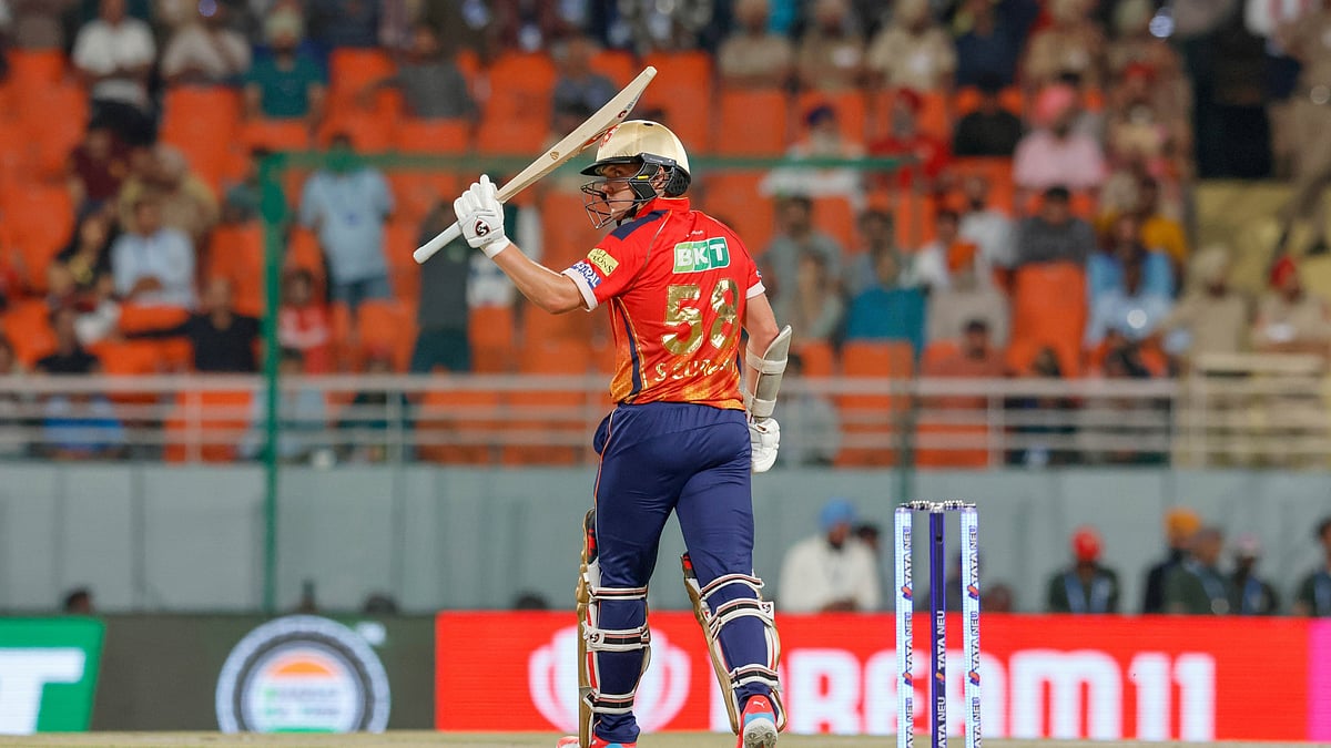 Photo: X/ @IPL : Punjab Kings batter Sam Curran after completing his half-century in IPL 2024.