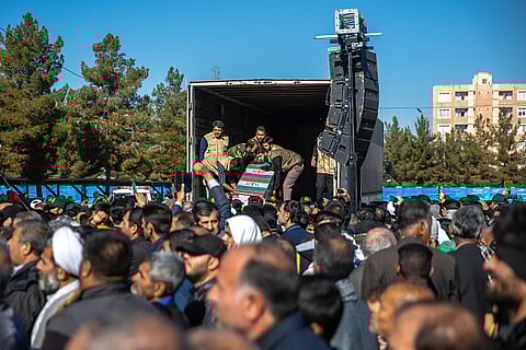 Iranian mourners carry coffins of the victims' funeral of yesterday's explosion on January 5, 2024, in Kerman, Iran.