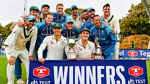 John Davidson/Photosport via AP : Australia players pose with their trophies after defeating New Zealand in the second Test in Christchurch on Monday (March 11, 2024).